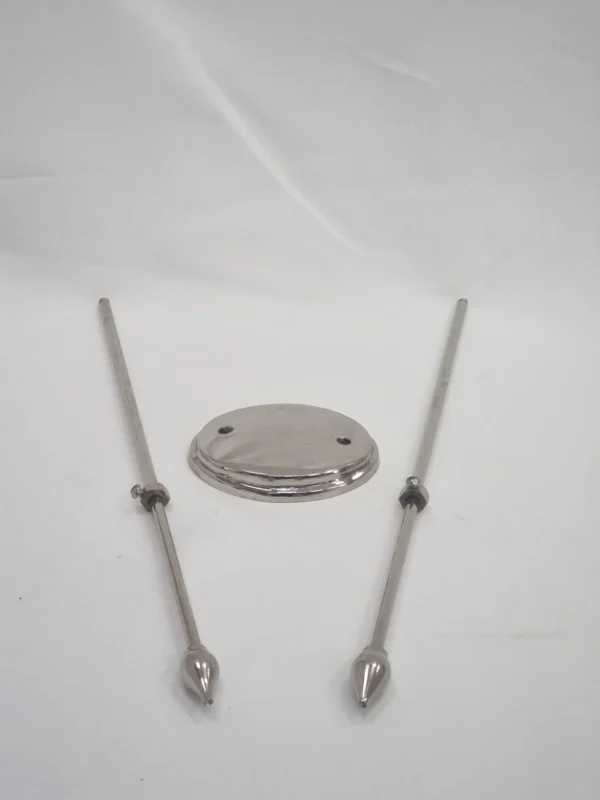 Silver Table stand components arranged on a white surface with a blue background