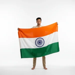 Boy standing with a waving India flag in his hand