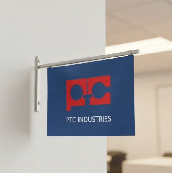 A Wall Mounted Flag With The Logo of PTC Industries