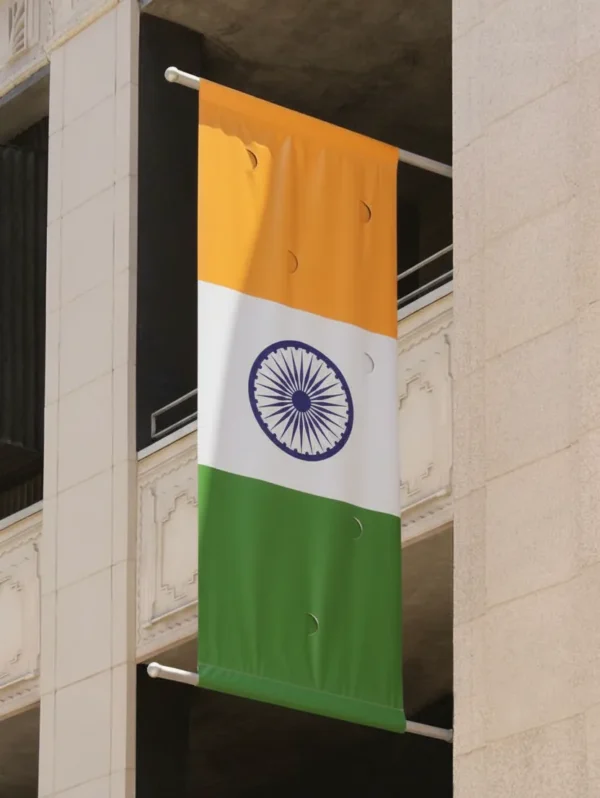 National wall mounted flag waving outside a building
