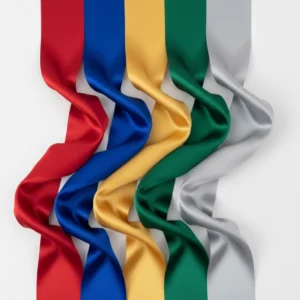 Colorful satin sashes displayed for pageant or ceremony